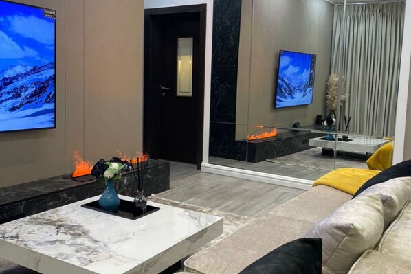 Living area - Modern 1 bedroom penthouse retreat. premium service with great views. (Abuja)