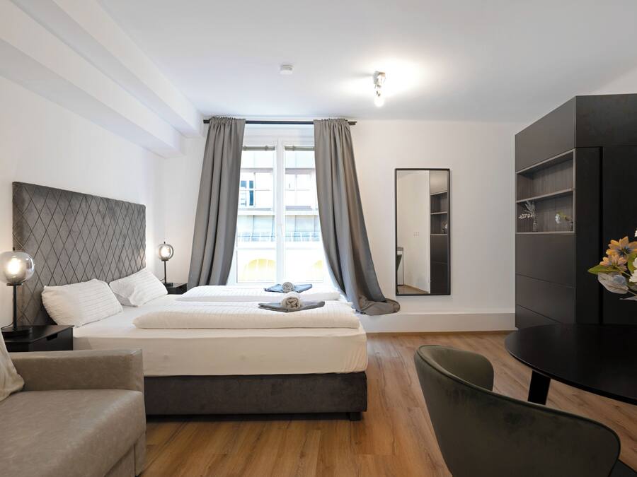 Economy Studio Suite, 1 Queen Bed, Non Smoking | Free WiFi, bed sheets