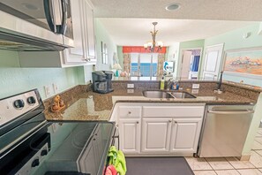 Fridge, microwave, coffee/tea maker, toaster