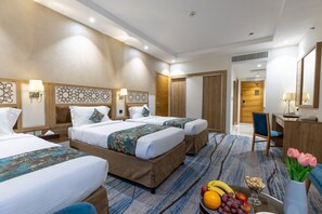 Deluxe Quadruple Room | Minibar, in-room safe, desk, iron/ironing board - TIME Ruba Hotel & Suites (Makkah)