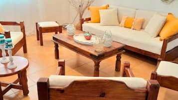 Traditional House | Living area | 42-inch Smart TV with cable channels, fireplace