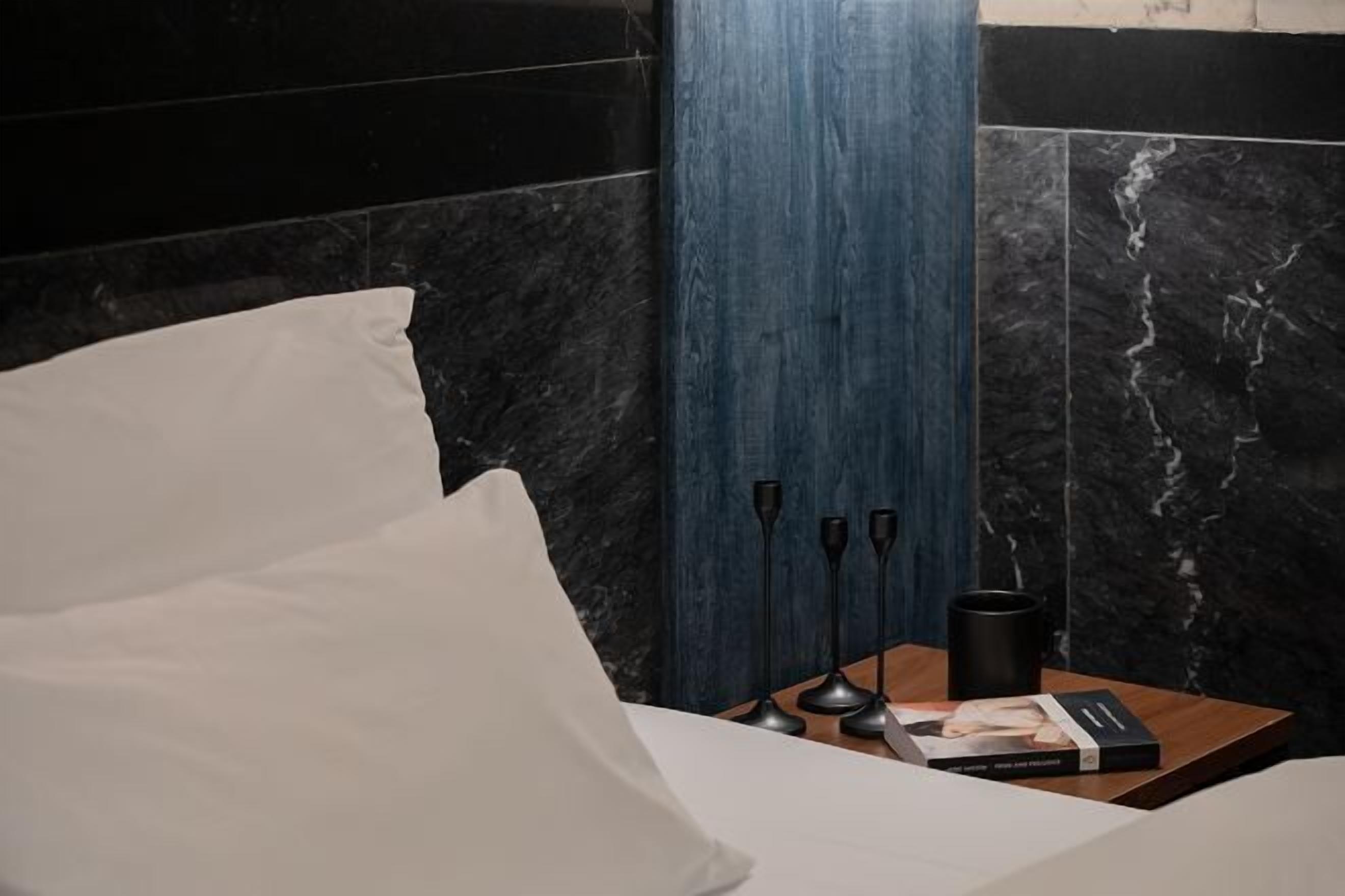 Premium bedding, down duvets, individually decorated