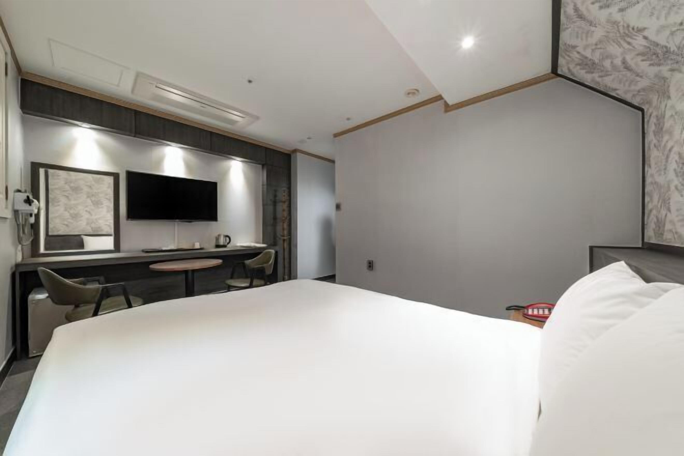 Premium bedding, down duvets, individually decorated