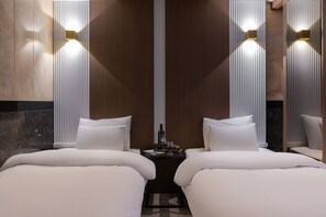 Signature Deluxe Twin | Premium bedding, down comforters, individually decorated