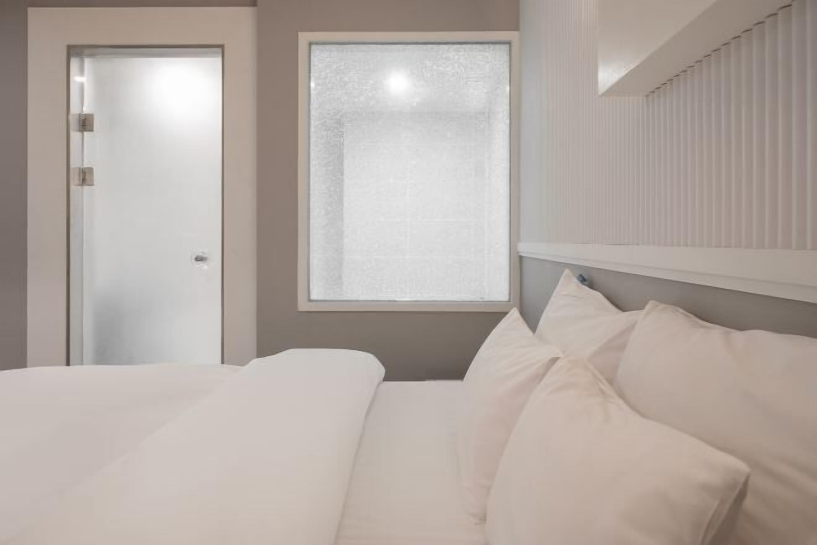 Premium bedding, down duvets, individually decorated