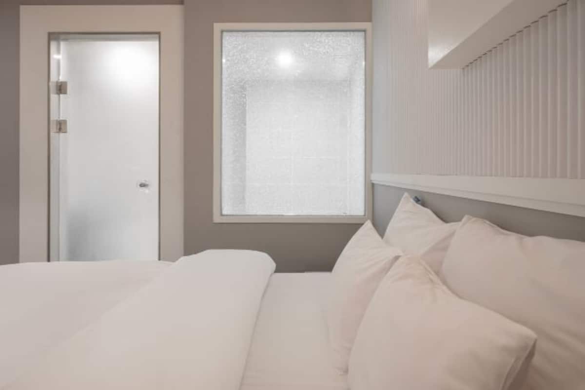 Premium bedding, down duvets, individually decorated