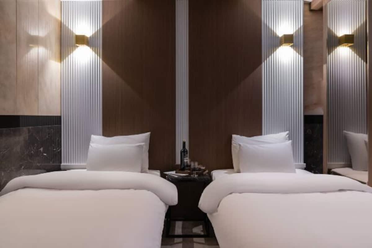 Premium bedding, down duvets, individually decorated