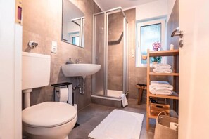 Hair dryer, towels, soap, toilet paper