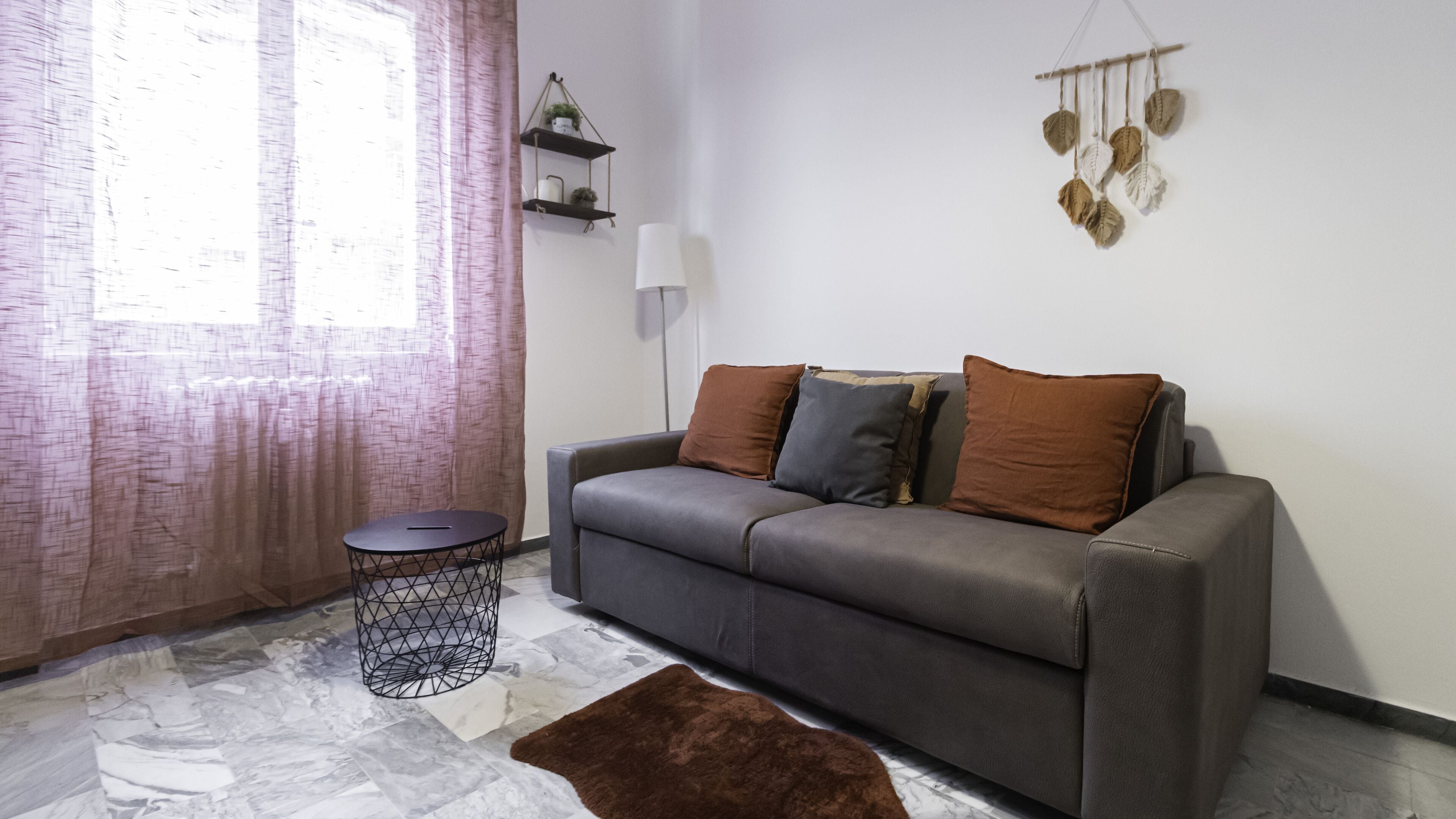 Apartment (1 Bedroom) | Living area | TV