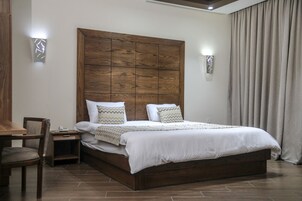 Deluxe Suite | Premium bedding, minibar, in-room safe, desk