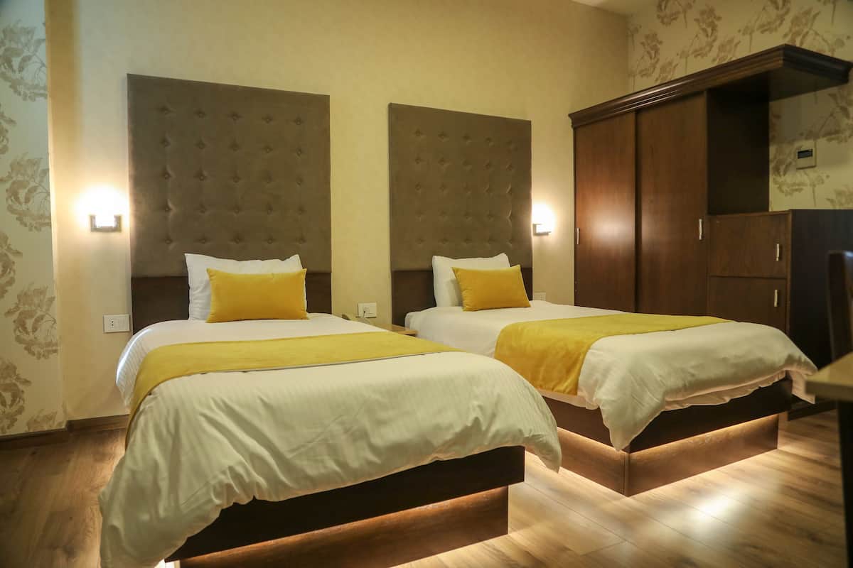Deluxe-Doppel- oder -Zweibettzimmer