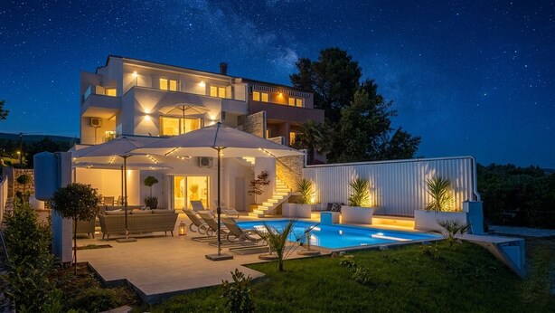 A modern two-story house with a swimming pool, outdoor seating, and a covered patio area. - Villa Punat seafront villa by Wiibuk (Kvarner - Punat) (Punat)