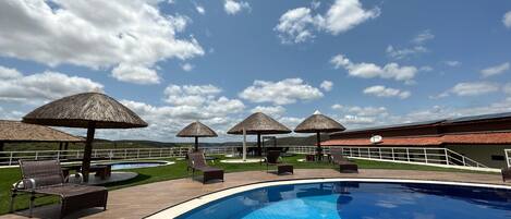 2 outdoor pools, open 7:00 AM to 9:00 PM, free cabanas, pool umbrellas