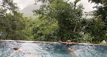 4 BHK VILLA WITH A PRIVATE INFINITY POOL SURROUNDED BY SERENE HILLS