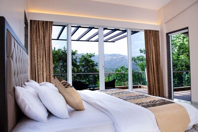 4 BHK VILLA WITH A PRIVATE INFINITY POOL SURROUNDED BY SERENE HILLS