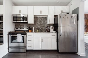 Fridge, microwave, oven, stovetop - Freshly Renovated Artist Condo and Pool Minutes to Downtown (Nashville)