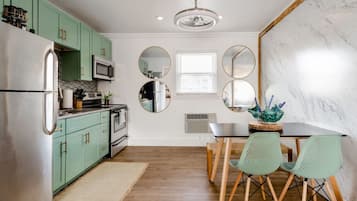 Fridge, coffee/tea maker, cookware/dishes/utensils