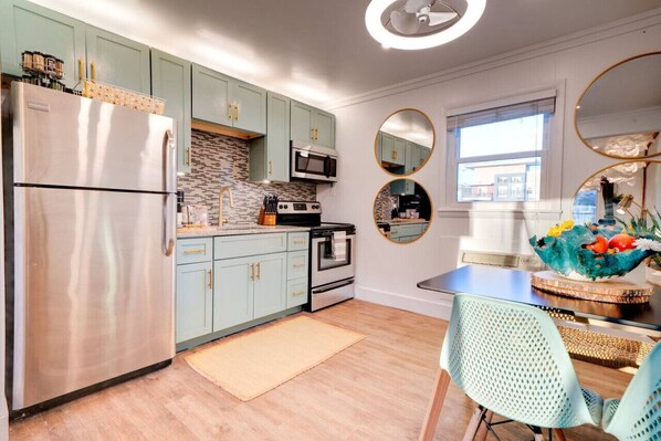 Fridge, coffee/tea maker, cookware/dishes/utensils