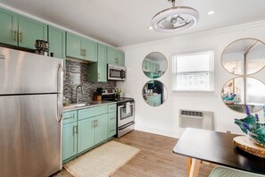 Fridge, coffee/tea maker, cookware/dishes/utensils