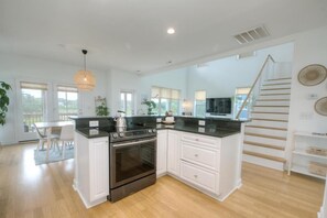 Fridge, microwave, oven, stovetop - Discover Oak Island's "Marsh to the Beach" - a spacious 3BR, 3BA haven for 8 near coastal fun! (Oak Island)