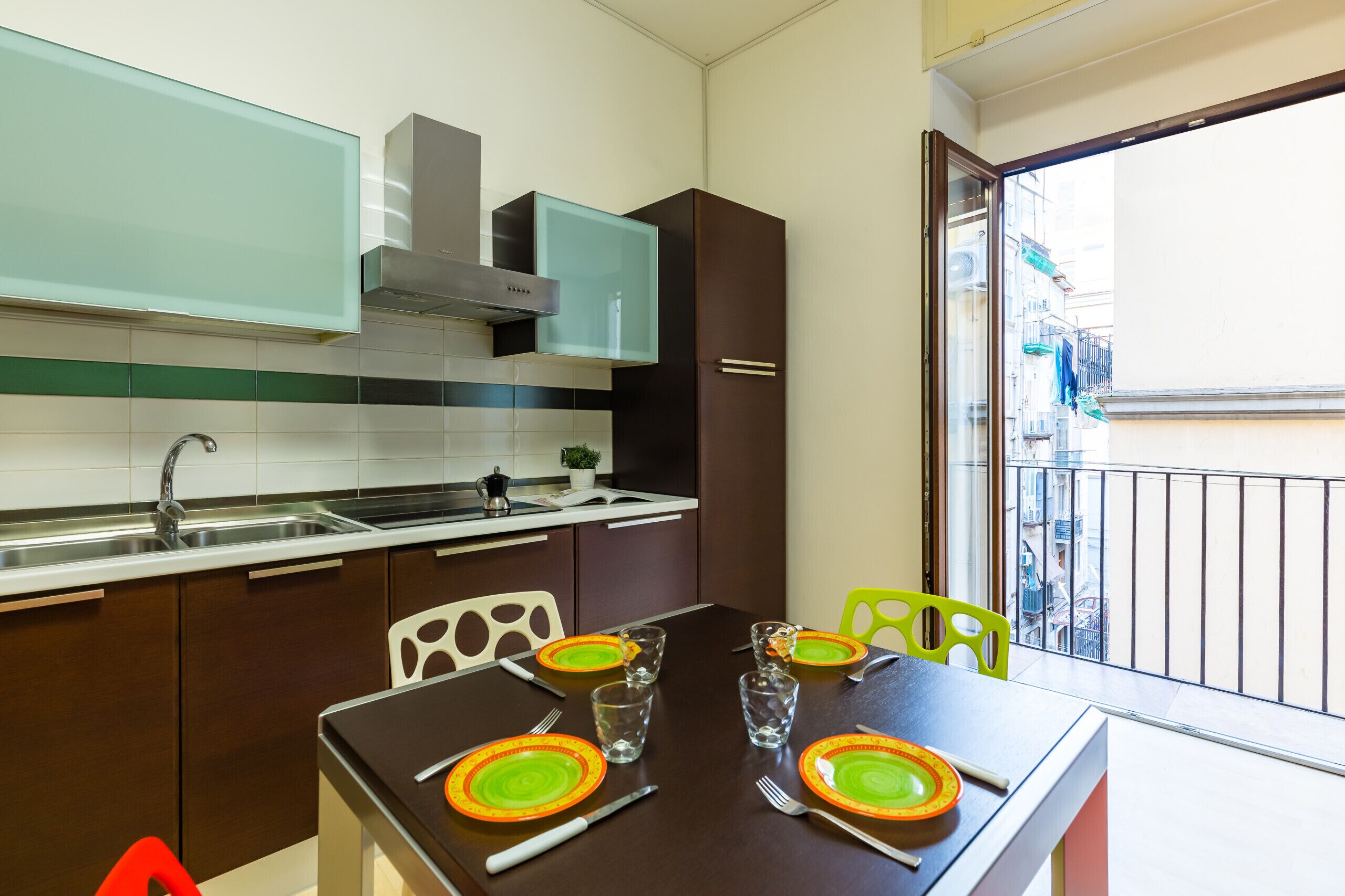 Fridge, electric kettle, cookware/dishes/utensils, dining tables