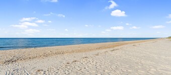 Beautiful St.George Island pool home, large patio pool surround & fire pit area.