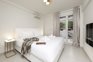 Comfort Apartment, 1 Bedroom, Garden View | 1 bedroom, iron/ironing board, free WiFi