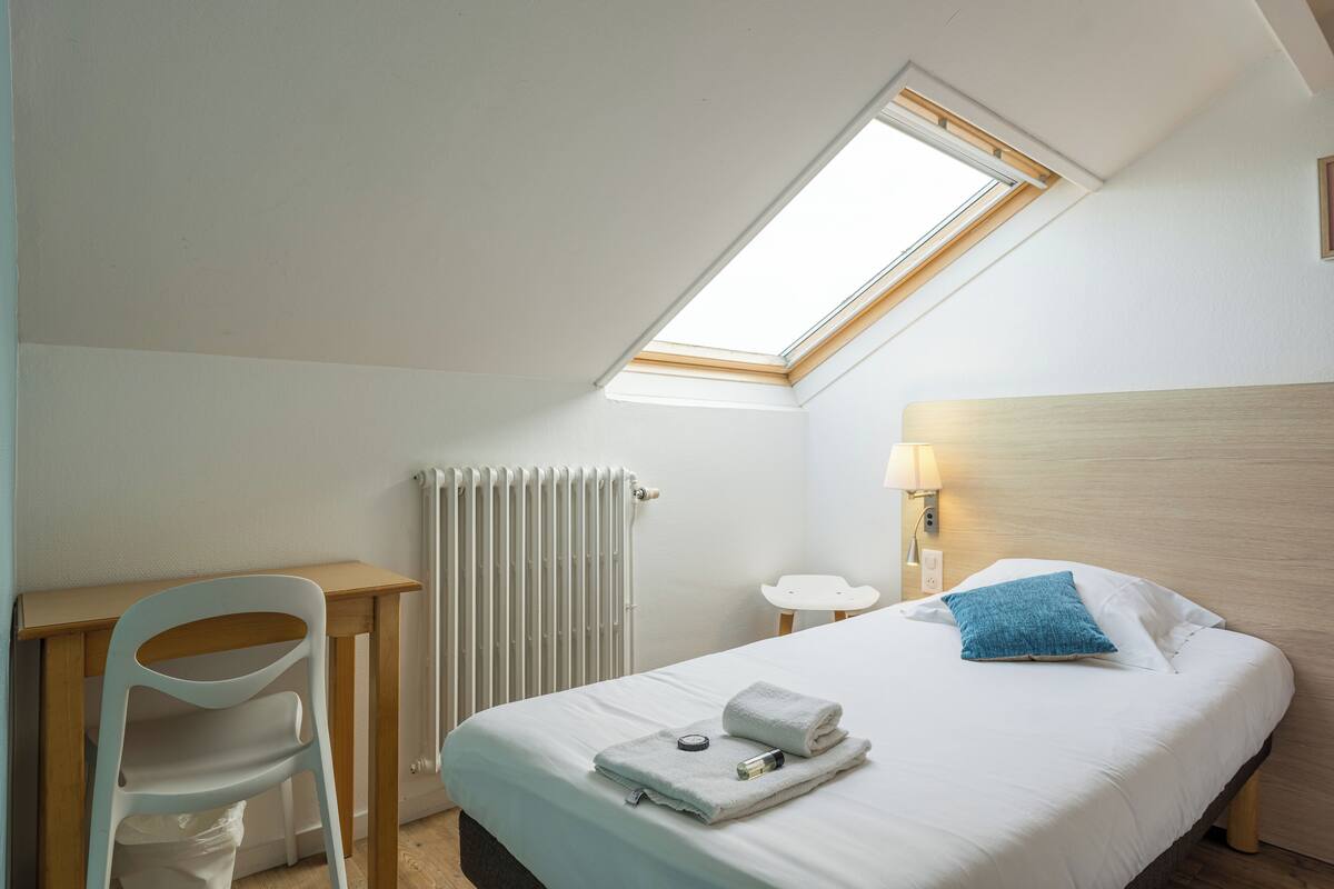 Habitación individual económica | Wifi gratis y ropa de cama
