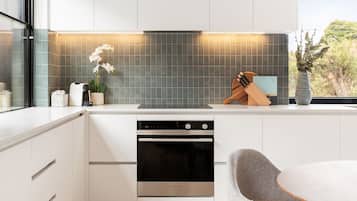 Two Bed One Bath Apartment With Parking | Private kitchen | Full-size fridge, microwave, oven, stovetop