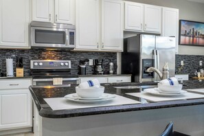 Fridge, microwave, oven, stovetop - Magical 4BR Lakefront Home • Pool, BBQ & Fun! (Kissimmee)