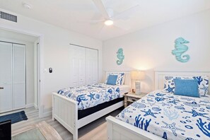 Desk, iron/ironing board, travel cot, WiFi - Sunny Retreat at Blind Pass Paradise with Pool (St. Pete Beach)