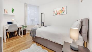 1 habitación, tabla de planchar con plancha, wifi gratis y ropa de cama