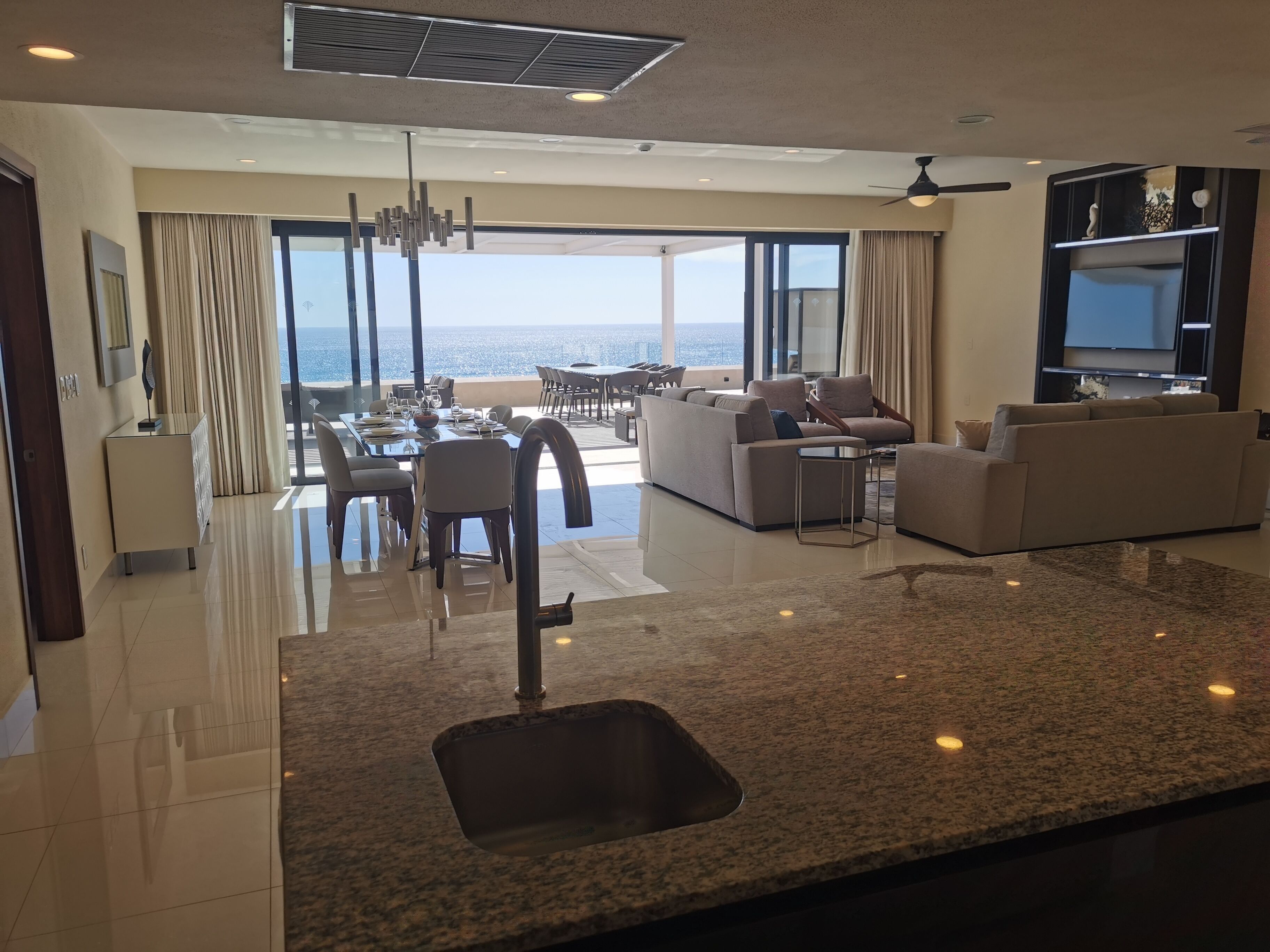 Panoramic Penthouse | Private kitchen | Full-size fridge, microwave, toaster, blender