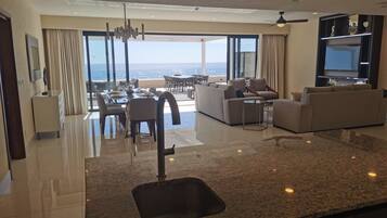 Panoramic Penthouse | Private kitchen | Full-size fridge, microwave, toaster, blender