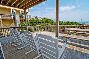 Outdoor dining - Angel's At the Pier East - Oceanfront Duplex in Emerald Isle, NC! (Emerald Isle)