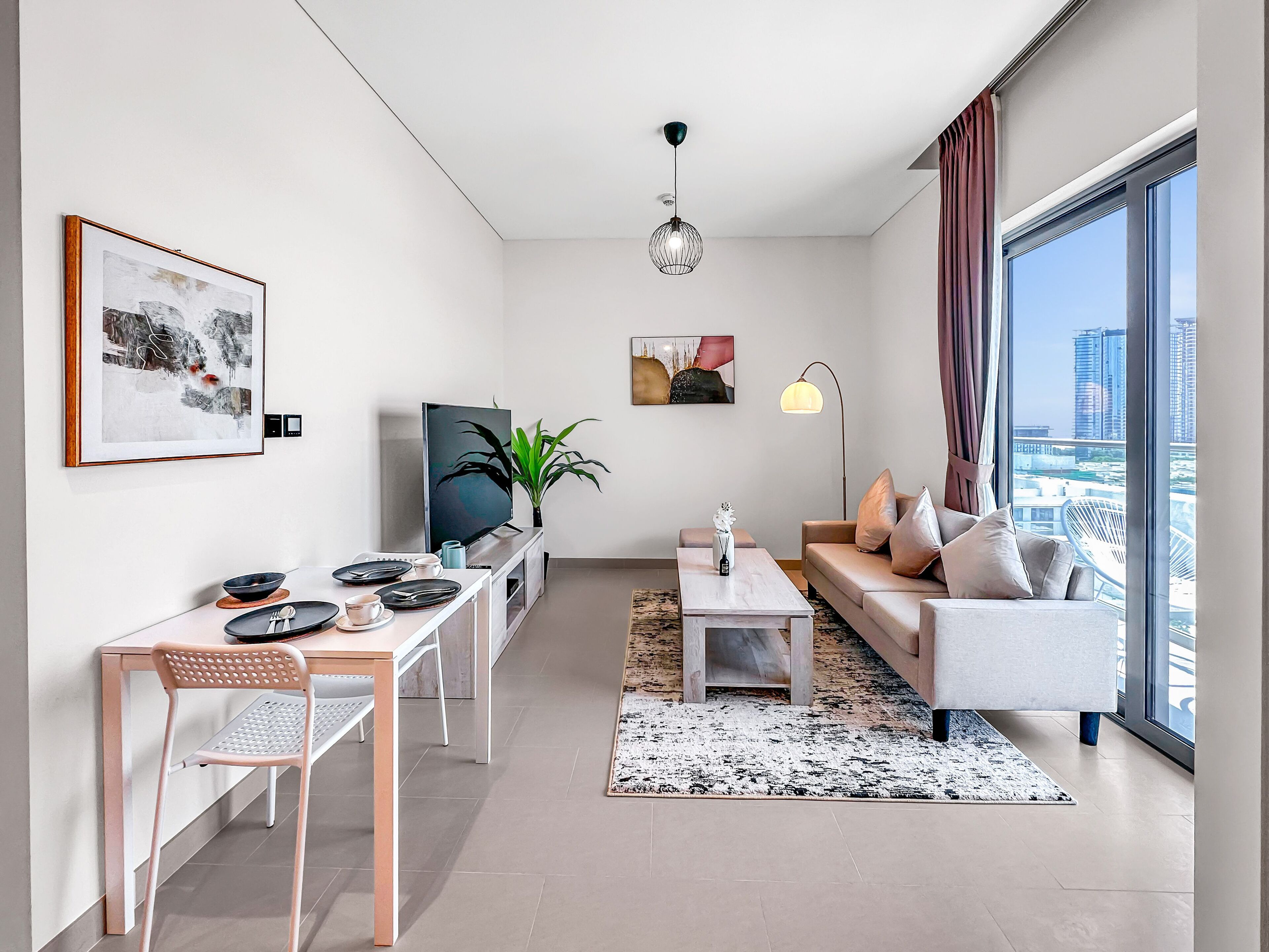 Elite Apartment | Living area | 50-inch Smart TV with cable channels