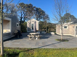 Outdoor dining - Screened porch overlooking marsh, spacious yard, patio, fire pit, and Close to Beach (Eastham)