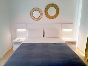 3 habitaciones, tabla de planchar con plancha, wifi y ropa de cama 