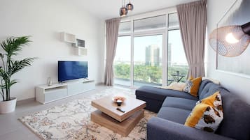 Apartamento conforto | Área de estar | Smart TV 50 polegadas com canais a cabo