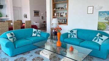 Smart TV, fireplace, table tennis, books