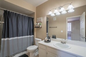 Hair dryer, towels, soap, shampoo