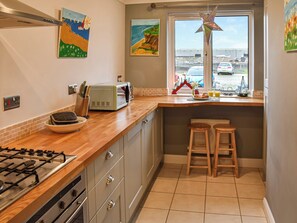 Dishwasher, high chair, cookware/dishes/utensils