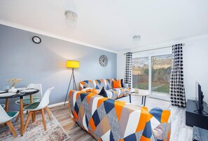 Ferienhaus | Wohnbereich | Fernseher