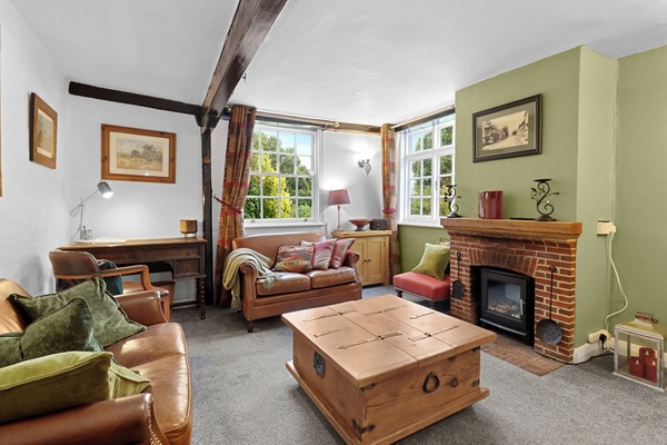 Lounge with classic leather Chesterfield style sofas..