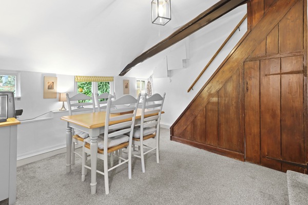 Dining Room with quirky sloped ceiling...
