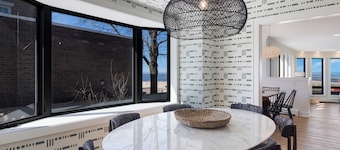 Beachfront Home on Lake Michigan beach. Spectacular sunsets, walk to downtown.