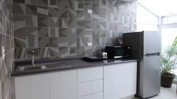 Fridge, microwave, stovetop, coffee/tea maker