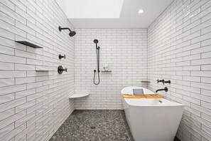 Shower, hair dryer, towels, soap