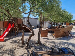 Children’s area - Mobile Home Domina near the beach with shared swimming pool (Pirovac)