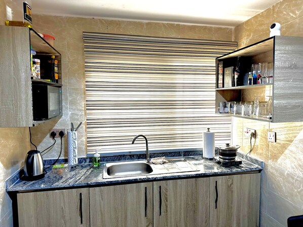Fridge, microwave, stovetop, electric kettle
